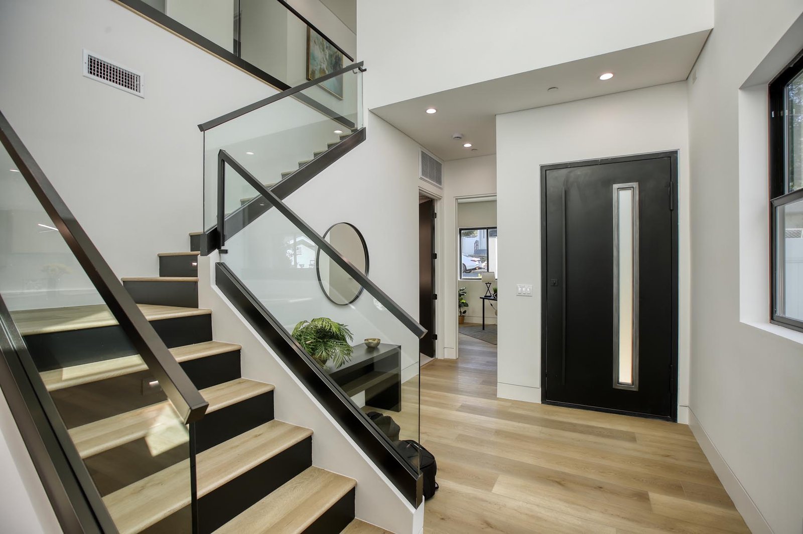Modern Sunland entry and architectural staircase